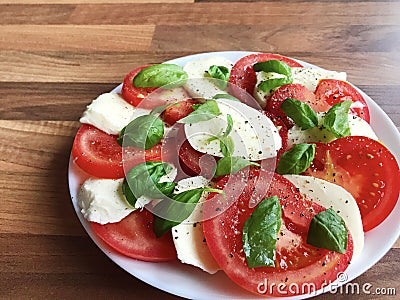 Photo of healthy salad with mozzarella, tomato and basil Stock Photo