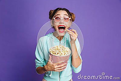 Photo of hipster girl 20s in sunglasses screaming and holding bu Stock Photo