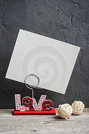 Photo holder with word Love Stock Photo