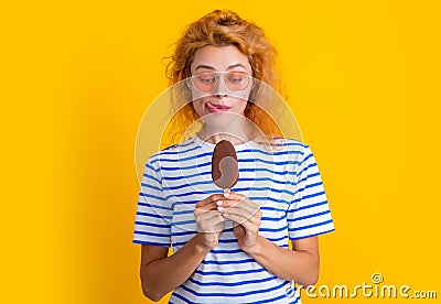 photo of hungry girl with icelolly ice cream at summer. girl with icelolly ice cream Stock Photo