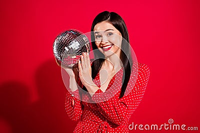 Photo of impressed brunette lady hold ball wear red dress isolated on vivid color background Stock Photo