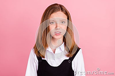 Photo of impressed shocked school girl wear white black uniform listening bad news isolated pink color background Stock Photo