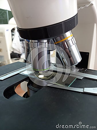 Photo of light microscope objectives of different magnifications. Stock Photo