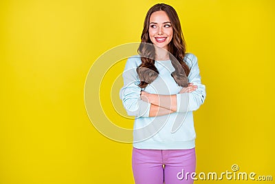 Photo of lovely charming girl tricky sly look side empty space excited coffee shop attract costumers crossed hands wear Stock Photo