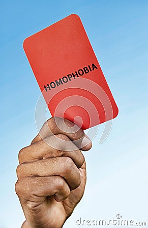 Man holding out a Homophobia red card Stock Photo