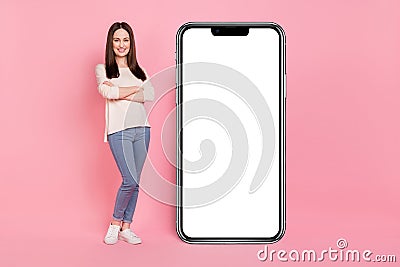 Photo of marketer lady presenting offer large big telephone touchscreen panel new design device isolated pink color Stock Photo