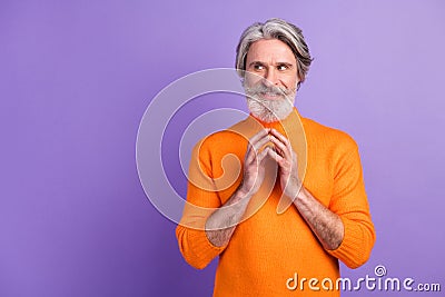 Photo of mature man happy positive smile cunning tricky idea plan look empty space isolated over purple color background Stock Photo