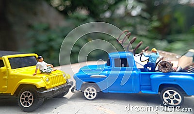 Conceptual Photo, Mini Figure Scavenger worker Loading corrosive bottle cup, screw, pencil, SIM card, spring and other used good i Stock Photo