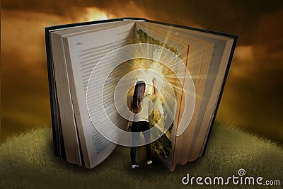Fairytale book with girl Stock Photo