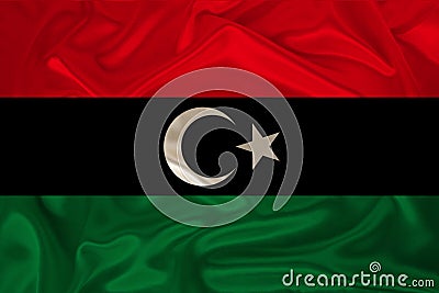 Photo of the national flag of the state of Libya on a luxurious texture of satin, silk with waves, folds and highlights, close-up Cartoon Illustration