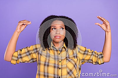 Photo of nervous lady make gesture talking hands look up wear checkered shirt isolated violet color background Stock Photo