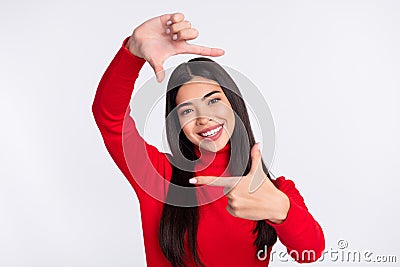 Photo of nice cheerful brown long hairdo lady shoot by fingers wear red sweater isolated on grey color background Stock Photo