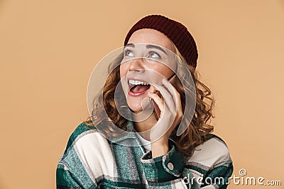 Photo of nice cheerful woman smiling and talking on cellphone Stock Photo