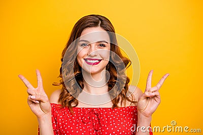 Photo of nice foxy lady hands showing v-sign symbol wear red dress with open shoulders isolated yellow background Stock Photo
