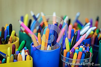 Photo of old brushes for painting, stand in a jar. Stock Photo