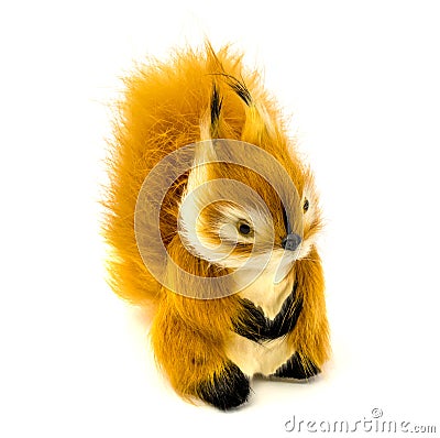 Orange statuette of a squirrel isolated on a white background Stock Photo