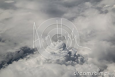 Aim High Motto Over The clouds Stock Photo