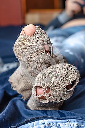 Photo of a pair of warm, knitted, brown full of socks Stock Photo