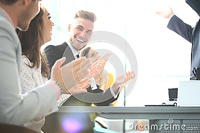 Photo of partners clapping hands after business seminar. Professional education, work meeting, presentation or coaching Stock Photo