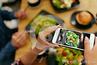 Photo On Phone. Closeup Woman Hands Photographing Food Stock Photo