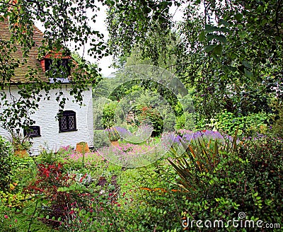 Kent country cottage countryside garden gardens victorian trees flowers plants Stock Photo