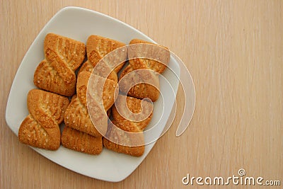 The photo of a pile of cookies or shortcake biscuits on the plate Stock Photo