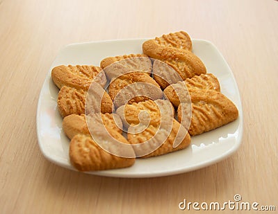 The photo of a pile of cookies or shortcake biscuits on the plate Stock Photo