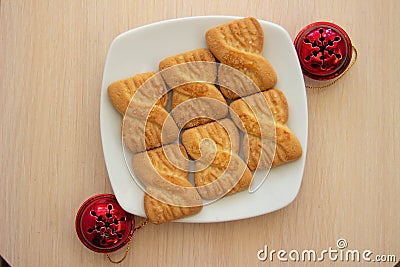 The photo of a pile of cookies or shortcake biscuits on the plate Stock Photo