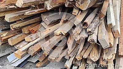 Photo of piles of wooden blocks from the rubble of houses Stock Photo