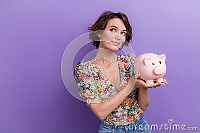 Photo portrait of attractive young woman piggy look empty space dressed stylish flower print clothes isolated on purple Stock Photo