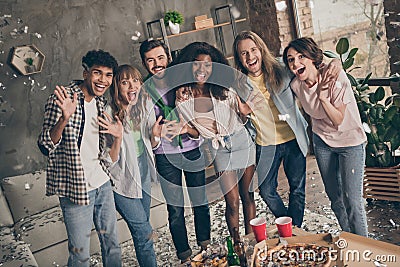 Photo portrait of company celebrating exams ending overjoyed happy embracing together at party Stock Photo