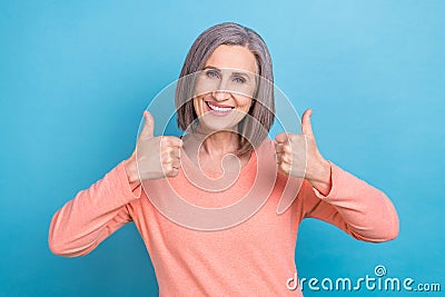 Photo portrait of gorgeous pensioner woman double thumbs up recommendation insurance company advertisement isolated on Stock Photo