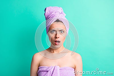 Photo portrait irritated woman turban on head after shower staring angry opened mouth isolated bright teal color Stock Photo