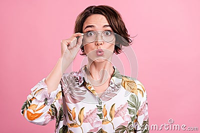 Photo portrait pretty girl whistling surprised wearing printed shirt glasses isolated pastel pink color background Stock Photo