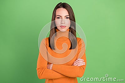 Photo portrait woman serious crossed hands casual outfit isolated pastel green color background Stock Photo