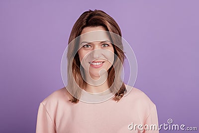 Photo of positive candid lady shiny beaming smile wear casual shirt on purple background Stock Photo