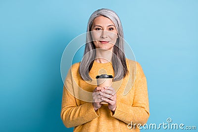 Photo of pretty calm aged woman white grey hairdo hold cup coffee drink have comfort free morning time cafe family wear Stock Photo