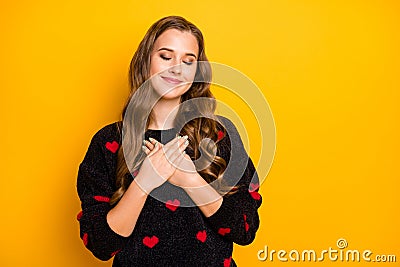 Photo of pretty charming lady holding palms on chest feeling harmony inner world eyes closed peace emotions wear hearts Stock Photo