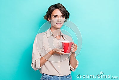 Photo of pretty cute lady wear stylish clothes hold mug hot tasty tea enjoy free time moment empty space on Stock Photo