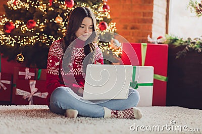 Photo of pretty lovey lady teen sit fluffy carpet choose gifts presents remote work handmade toys shop enjoy cozy time Stock Photo