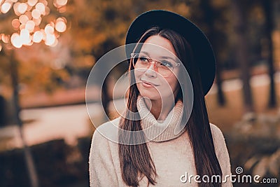 Photo of pretty positive lovely person imagine think spend free time stroll park outdoors Stock Photo