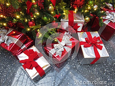 Many Christmas presents under the tree Stock Photo