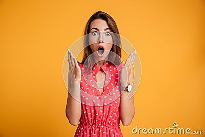 Photo of pretty shocked emotionally woman in red dress looking a Stock Photo