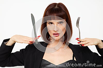 photo pretty woman knife and fork in hands emotions posing background Stock Photo