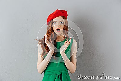 Redhead young shocked lady Stock Photo
