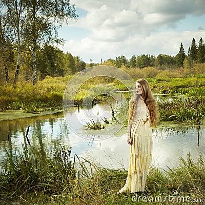 Photo of romantic woman in fairy forest Stock Photo