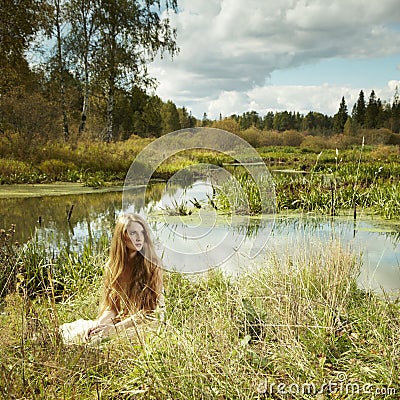 Photo of romantic woman in fairy forest Stock Photo
