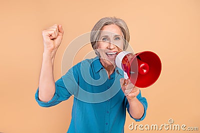 Photo of satified ecstatic woman with bob hairstyle wear blue shirt scream in loudspeaker win lottery isolated on pastel Stock Photo