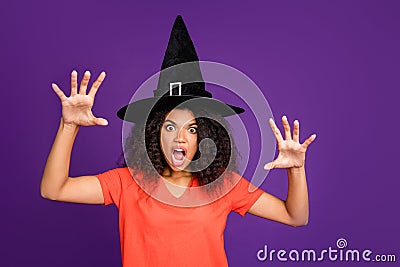 Photo of scary terrible spooky frightful warlock wearing conical cap casting spell to curse you with horrifying facial Stock Photo
