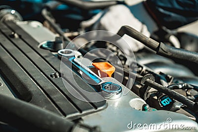 The photo of a wrench on the engine Stock Photo